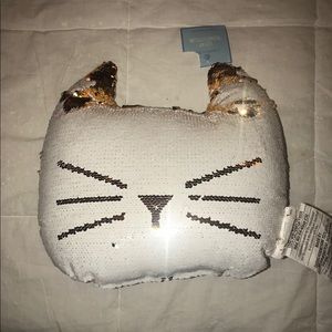 Reverse sequin cat pillow gold and white.